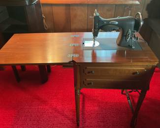 White sewing machine Vintage housed in wooden sewing cabinet - cord is in very good condition for its age 