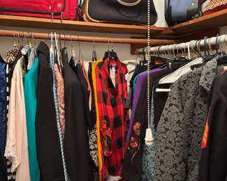 Women’s clothes, many with tags still on