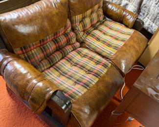 This wacky leather and wood plush couch