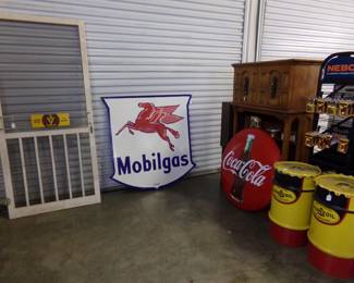 Original General Store screen door with door push! Nice Repop double sided Mobilgas Pegasus sign. Pennzoil large barrels with lids, ideal for shop trash cans  
