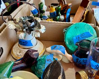 Mixed lot of small ceramic figures, including a brown rearing horse, bird bud vases with yellow and pink roses, and two snow-baby style children.