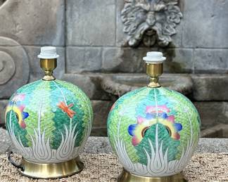 These hand-painted porcelain lamps feature a bold botanical motif rendered in rich greens, soft whites, and jewel-tone accents — a fresh reinterpretation of traditional Famille Verte styles. The layered leafy pattern is punctuated by stylized florals in vibrant hues, creating a look that feels both lush and modern.
Each lamp is crafted in Jingdezhen, China, the porcelain capital for over a thousand years. The design draws inspiration from classical Chinese symbolism, where lotus petals represent purity and rebirth, and vivid color was traditionally used to express joy and prosperity.
Hand-painted porcelain body
Brass base and fittings
No shades included
Available in multiple shapes and heights