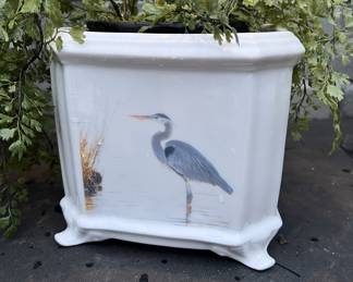 Assorted ceramic vases, cache pots in heron, nautical, bird, and animal motifs