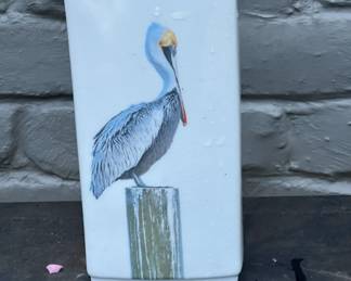 Assorted ceramic vases, cache pots in nautical, bird, and animal motifs