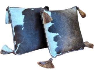 Pair of genuine cowhide accent pillows.