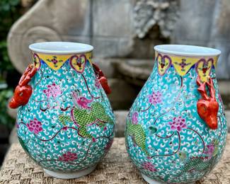 Pair of Turquoise Famille Verte Porcelain Qilin Vases with Red Deer Handles
Vibrant turquoise ground vases with hand-painted Qilin and deer heads. Famille Verte palette from Jingdezhen. Sold as a pair. Approx. 15”H.