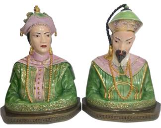 Pair of vintage Chinese emperor and empress busts in hand-painted porcelain and enamel with gilt detailing. Dressed in imperial robes of celadon green and lavender with intricate embellishments. Excellent condition — striking display pieces.