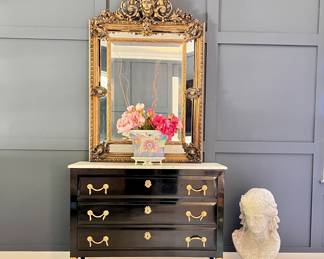 Ebonized Marble Top Dresser Attributed to Maison Jansen – $5,495 Firm.
Rare opportunity to acquire a **Directoire-style ebonized mahogany dresser with Carrara marble top**, attributed to legendary Paris design firm **Maison Jansen**, c. 1940s. This exceptional piece features:
* Rich ebonized finish with original patina
* Fluted legs and neoclassical proportions
* Three full-width drawers with bronze-mounted hardware
* Solid, veined white marble top (removable for transport)
* Pristine vintage condition — truly investment-worthy
Maison Jansen was one of the most influential design houses of the 20th century, furnishing European palaces, elite Paris apartments, and even the Kennedy White House. Pieces attributed to Jansen rarely appear in such well-preserved condition and are prized by collectors and decorators alike.
Perfect for an entryway, bedroom, or living room — this piece brings architectural structure and timeless French style to any space.