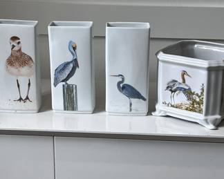Assorted ceramic vases, cache pots in nautical, bird, and animal motifs