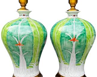 These hand-painted porcelain lamps feature a bold botanical motif rendered in rich greens, soft whites, and jewel-tone accents — a fresh reinterpretation of traditional Famille Verte styles. The layered leafy pattern is punctuated by stylized florals in vibrant hues, creating a look that feels both lush and modern.
Each lamp is crafted in Jingdezhen, China, the porcelain capital for over a thousand years. The design draws inspiration from classical Chinese symbolism, where lotus petals represent purity and rebirth, and vivid color was traditionally used to express joy and prosperity.
Hand-painted porcelain body
Brass base and fittings
No shades included
Available in multiple shapes and heights