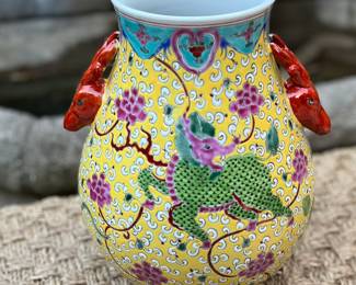 Incredible large-scale Famille Jaune style porcelain vase, fully hand-painted in the traditional Jingdezhen method. Features mythical Qilin creatures on a bright yellow scrollwork ground, flanked by rare figural red deer handles. A striking collector’s piece that blends symbolic meaning with bold color and fine craftsmanship.
