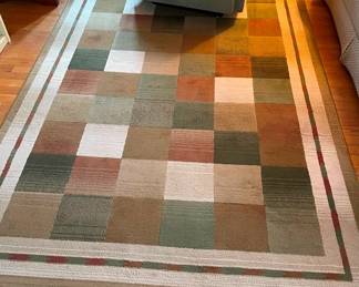 There is a set of 4 matching rug set