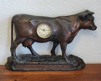 St. Charles Cream figural cow cast iron advertising clock