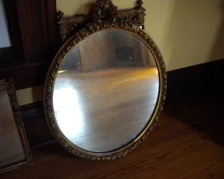 Several ornate antique mirrors