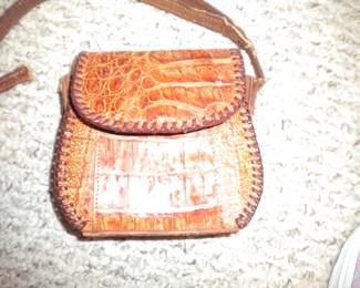 Small alligator purse with broken strap