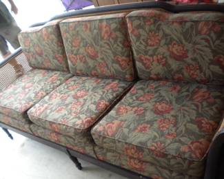 Newly upholstered and replaced caning antique parlor sofa
