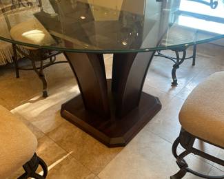 NEW 54" ROUND GLASS TOP TABLE WITH MODERN DARK WOODEN BASE AND 4 MATCHING CHAIRS.