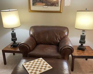 Dark brown, leather chair and matching ottoman