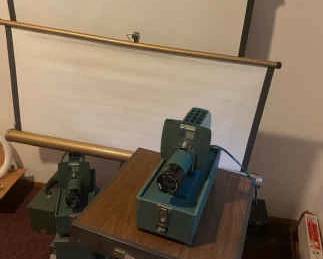 Two Vintage Argus Slide Projectors Two Screens Table History Of Slides Slide Containers