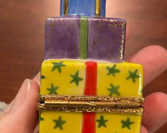 #201	Limoges stack of presents trinket box	 $50.00 
