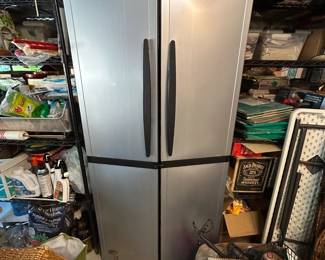 #85 Garage storage cabinet 2 doors 4 shelves 34x17x70 $75.00