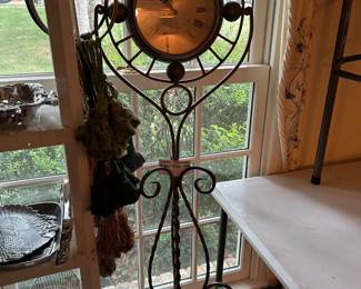 #322	Seth Thomas floor clock. Metal base 61" H. Battery operated	 $30.00 
