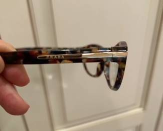 #115	Prada Prescription Glasses (glass can be changed out)	 $40.00 
