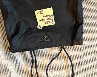 #199	Prada Black Nylon Handbag	 $50.00 
