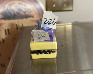 #226	Limoges stack of presents trinket box	 $60.00 
