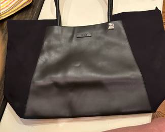 #125	Tumi Travel Tote Black 	 $75.00 

