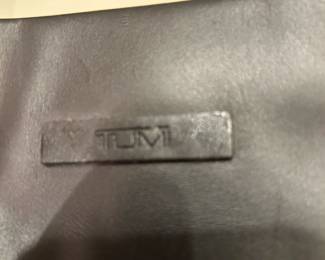 #125	Tumi Travel Tote Black 	 $75.00 
