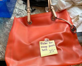 #236	Michael Kors Orange Plastic Tote	 $25.00 
