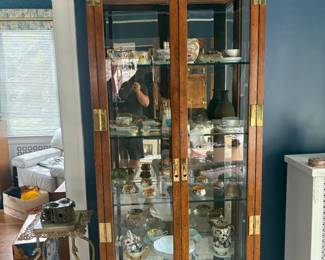. . . great Henredon curio cabinet