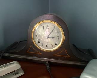 . . . antique 8-day-wind mantle clock