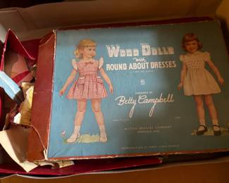 . . . Wood Dolls paper dresses