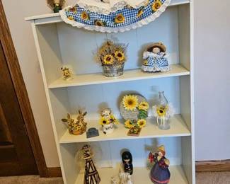 Assorted sunflower decor. Shelf and all items sold separately.