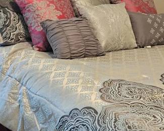 Queen comforter set with coordinating accent pillows.