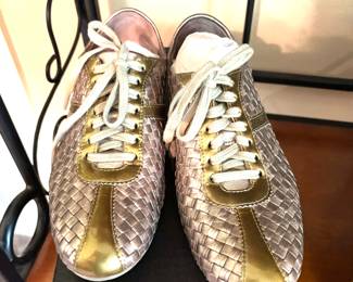 Cole Haan gold sneakers