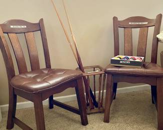 oak chairs with cushions, pool sticks, pool balls