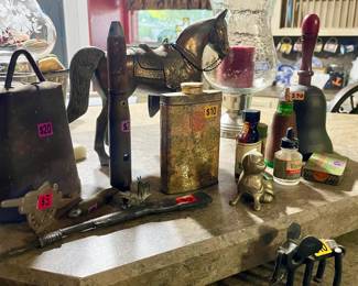 brass trinkets, bells, and figurines