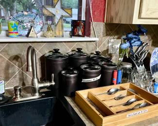 canisters, sets of silverware and kitchen knives