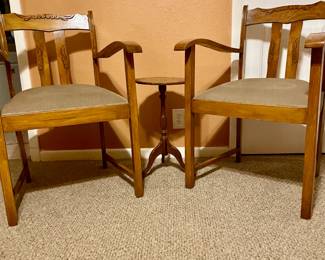 wooden arm chairs and side table