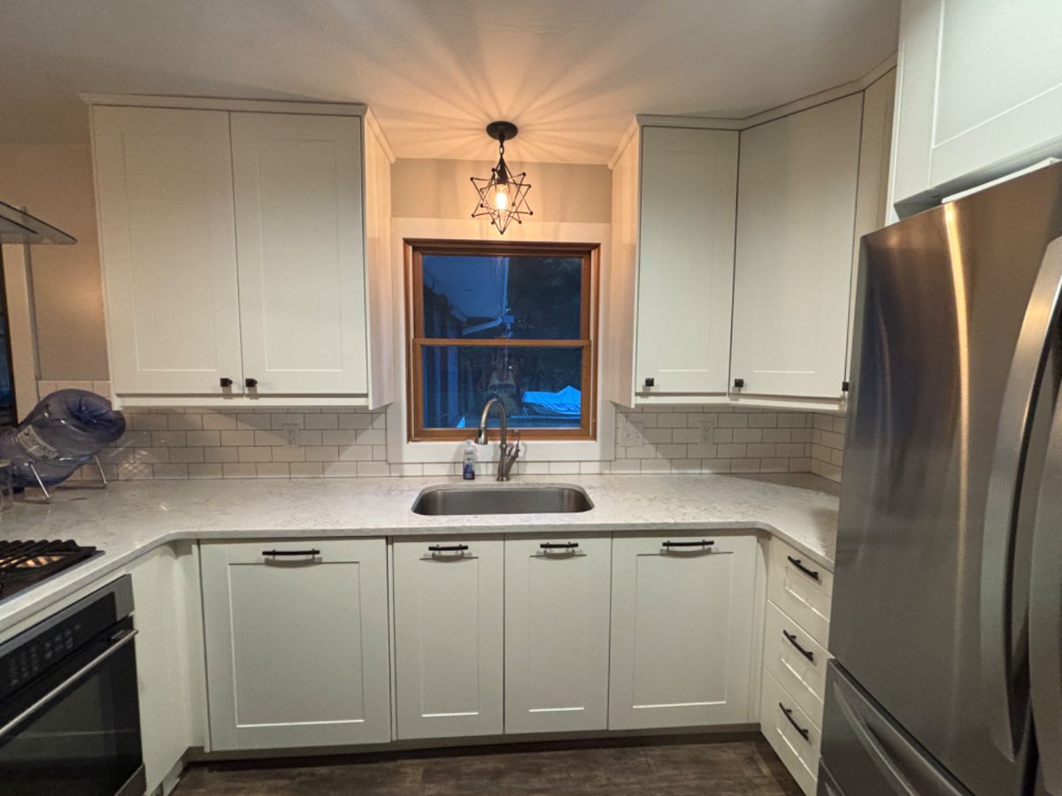 Kitchen cabinets, oven, cooktop, hood, dishwasher. Great condition. 