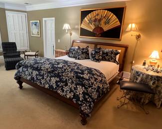 King bed, linens, vanity bench, Framed fan, lamps, side table