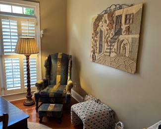 Wing chair and ottoman, upholstered bench, woven wall hanging, floor lamp