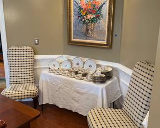 Queen Anne side chairs, Royal Copenhagen china, artwork by Zupan
