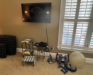 TV, small painted table, neck massagers