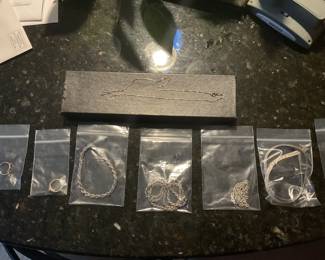Several Jewelry pieces of Italy 925 Sterling. You will also find a large amount of costume jewelry.