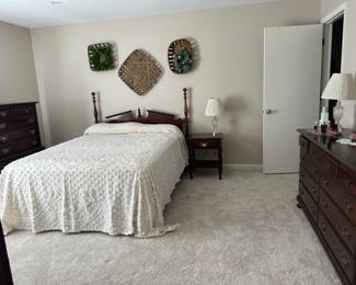 Full size bedroom suite with matching dresser , mirror, chest of drawer and nightstand.