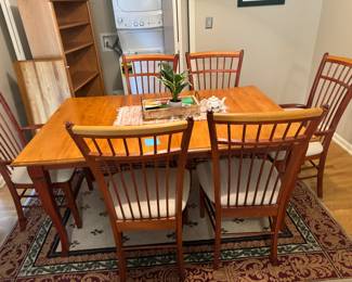 Dining room table with leaf and 6 chairs, including two captains chairs